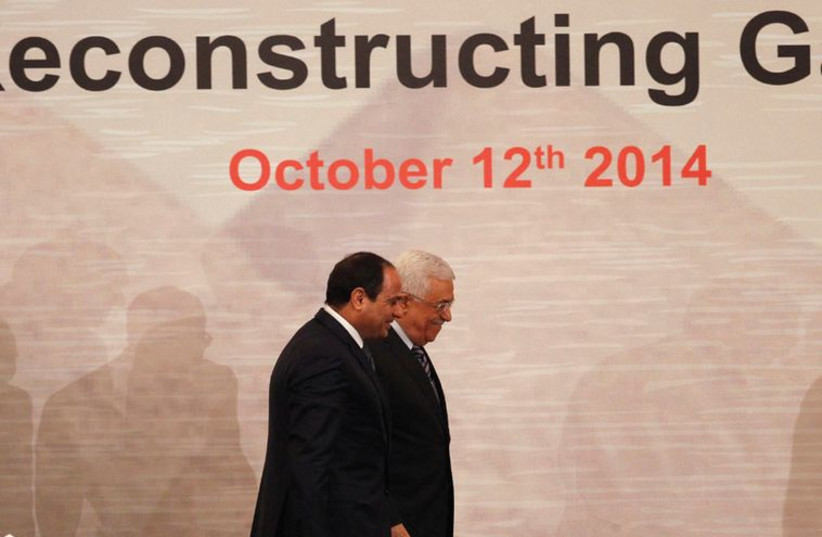 PA President Mahmoud Abbas and Egyptian President Abdel Fattah al-Sisi attend the Gaza reconstruction conference (photo credit: MOHAMED ABD EL GHANY/REUTERS)
