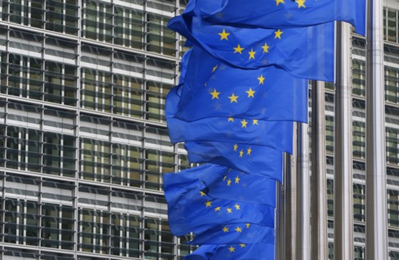 European Union flags (photo credit: REUTERS)