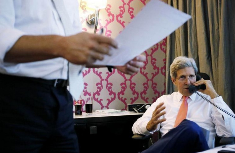 US Secretary of State John Kerry speaks on the phone to Prime Minister Benjamin Netanyahu (photo credit: REUTERS)