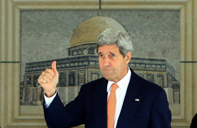US Secretary of State John Kerry gestures before meeting the Palestinian leadership in Ramallah (photo credit: REUTERS)