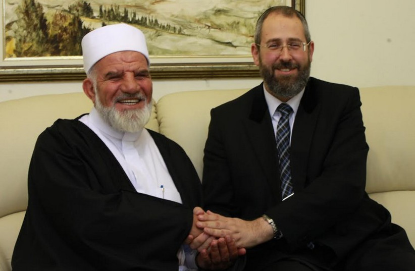 Chief Rabbi David Lau (R) met with Sheikh Muhammad Kiwan (photo credit: Courtesy)