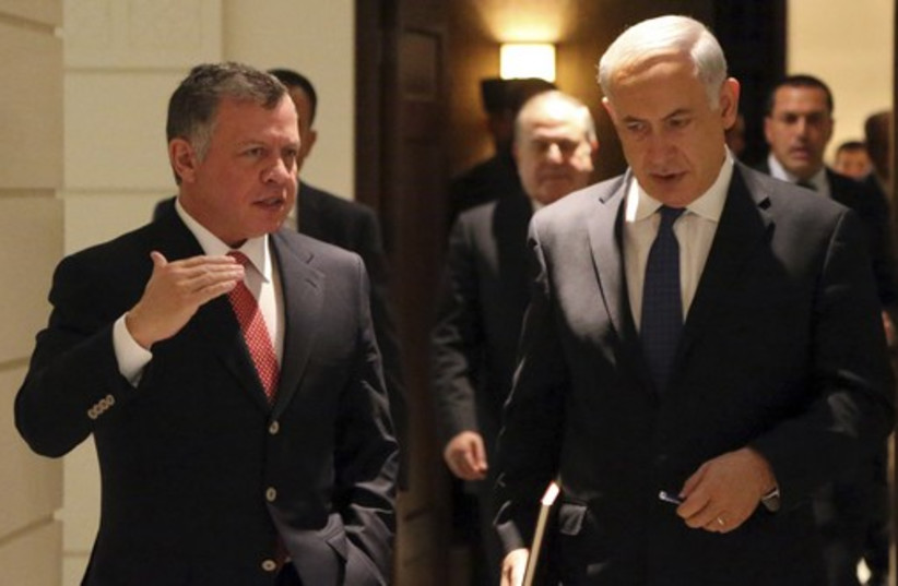 Jordan's King Abdullah walks with Prime Minister Benjamin Netanyahu (photo credit: REUTERS)