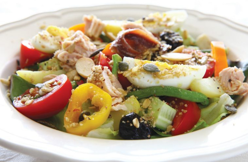 Vegetable salad with tuna and savory couscous granola (photo credit: LIRON ALMOG)