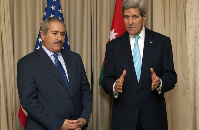 US Secretary of State John Kerry addresses the media alongside Jordanian Foreign Minister Nasser Judeh before the two held a bilateral meeting in Paris, France, on November 5, 2014. (photo credit: STATE DEPARTMENT PHOTO)