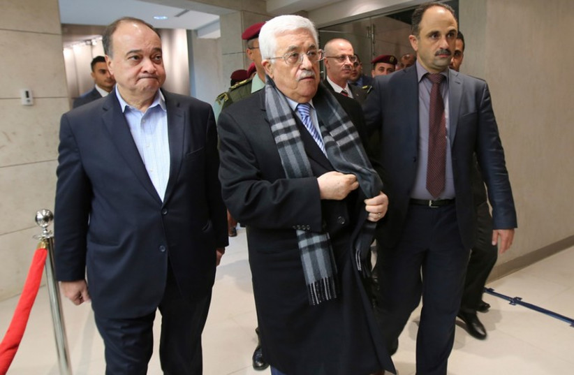 Palestinian Authority President Mahmoud Abbas arrives for the opening of a museum of late Palestinian leader Yasser Arafat in Ramallah, November 9 (photo credit: REUTERS)