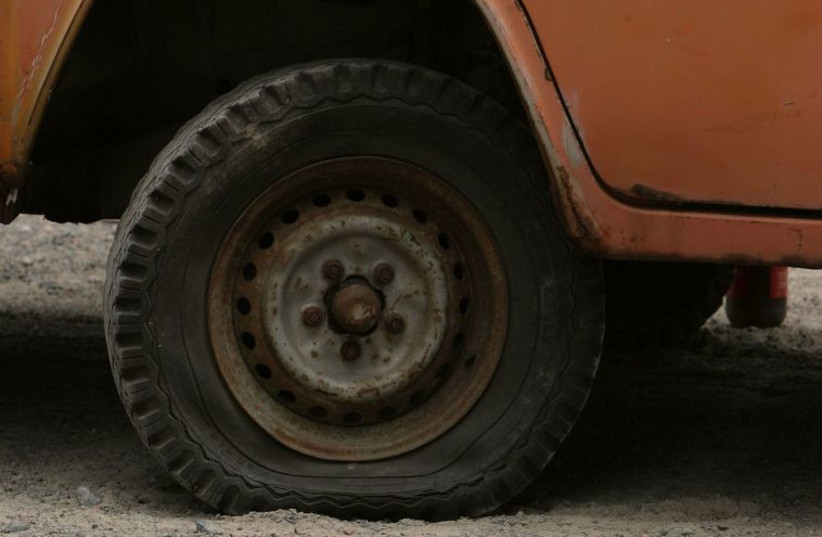 Flat tire (illustrative photo) (photo credit: INGIMAGE)