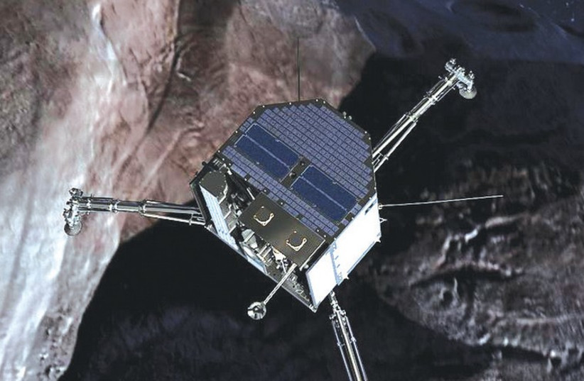 THE ‘PHILAE’ robotic lander approaches the surface of a comet (Illustrative) (photo credit: Wikimedia Commons)