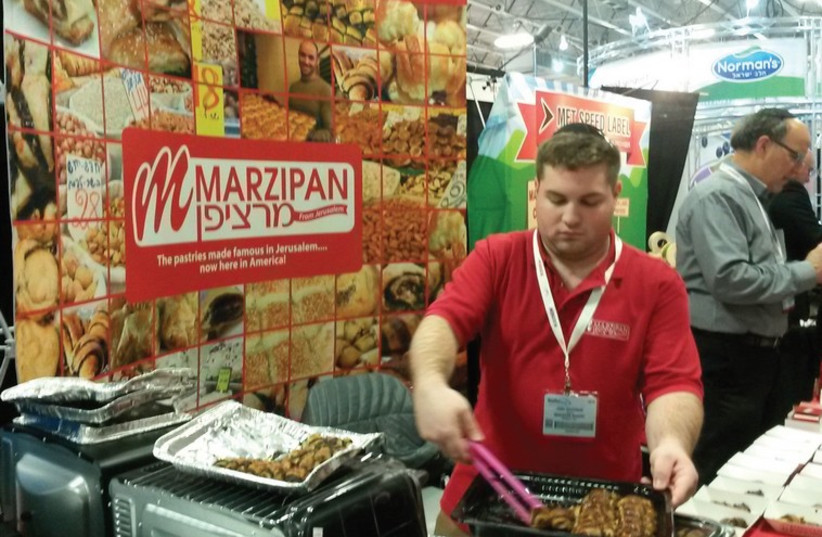 JERUSALEM’S OWN Marzipan bakery offers its iconic chocolate and cinnamon ‘rugelach’ at the annual Kosherfest trade show in New Jersey (photo credit: AMY SPIRO)