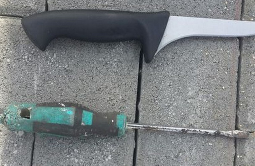 Knife and screwdriver found on suspect  (photo credit: POLICE SPOKESPERSON'S UNIT)