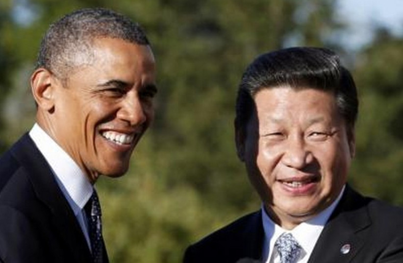 US President Barack Obama meets with China's President Xi Jinping at the G20 Summit (photo credit: REUTERS)