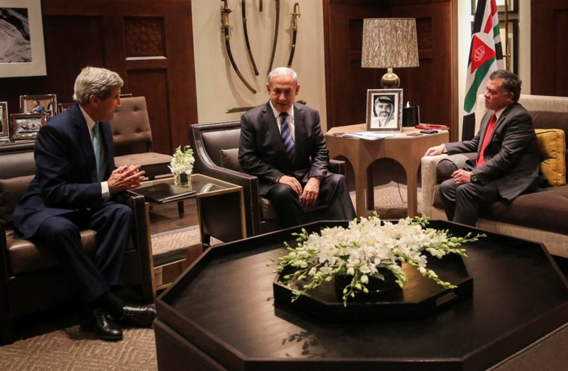 Kerry, Netanyahu and King Abdullah meet in Amman  (photo credit: REUTERS)
