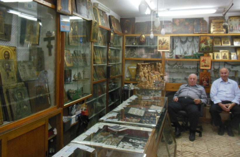 The owners of "Salman Souvenir" have witnessed 50 years of Old City history (photo credit: ARIEL COHEN)