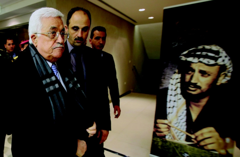 Mahmoud Abbas lors de la commemoration le 11 novembre (photo credit: REUTERS)
