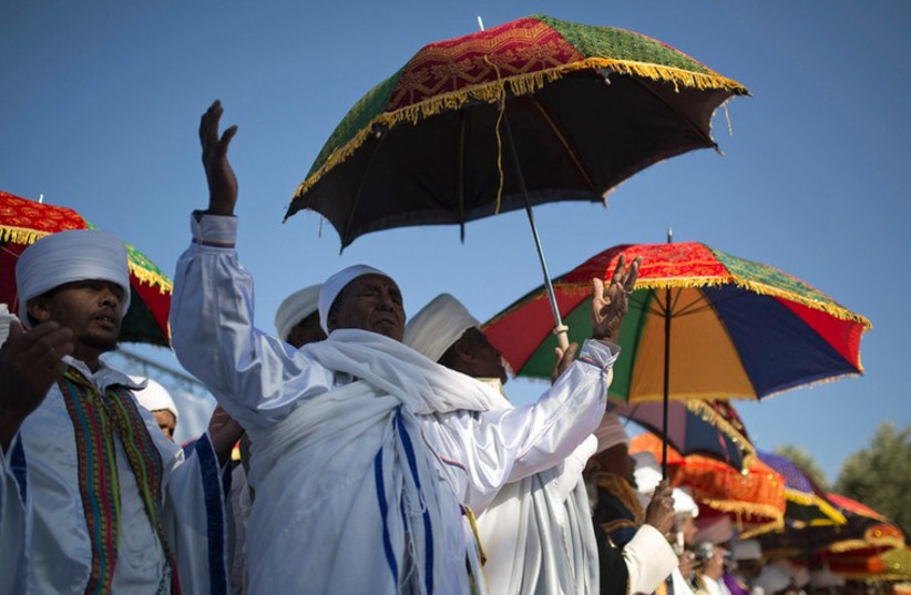 Members of the Ethiopian Jewish community in Israel mark the holiday of Sigd in Jerusalem November 20, 2014 (photo credit: REUTERS/AMIR COHEN)