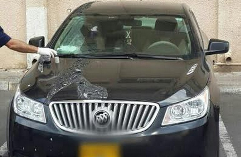 Sheikh Samir Assi's vandalized car (photo credit: POLICE SPOKESPERSON'S UNIT)