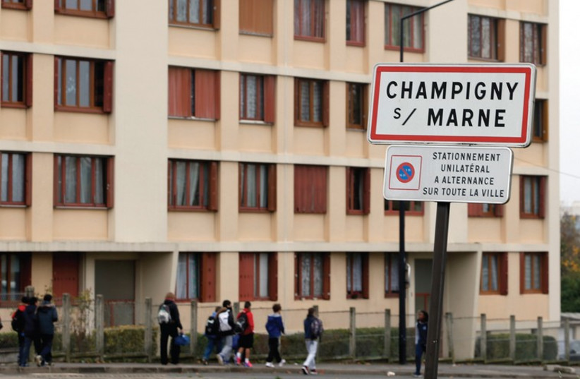 A ROAD sign is seen at the entry of Champigny-sur-Marne, East of Paris, from where a convert and Jihadist in Syria is thought to have come (photo credit: REUTERS)