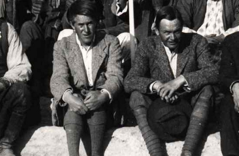 T.E Lawrence (left) seated next to Leonard Woolley in Carchemish in 1913. (photo credit: Wikimedia Commons)