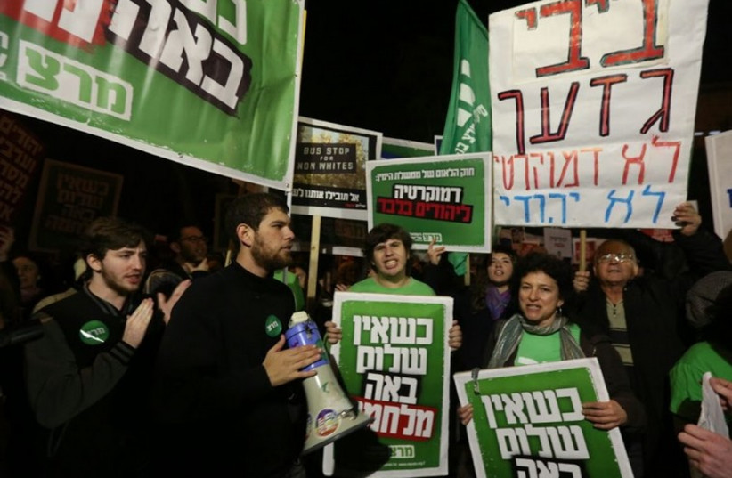 Protester rally against the so-called 'Jewish state bill' at the Prime Minister's Residence in Jerusalem (photo credit: MARC ISRAEL SELLEM/THE JERUSALEM POST)