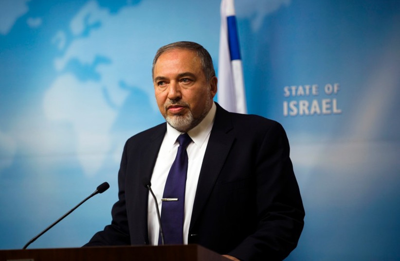 Foreign Minister Avigdor Liberman gives a statement to the media at his Jerusalem office December 2 (photo credit: REUTERS)