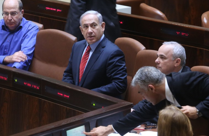 Netanyahu in the Knesset with Ya'alon, Lapid and others, December 3, 2014 (photo credit: MARC ISRAEL SELLEM)