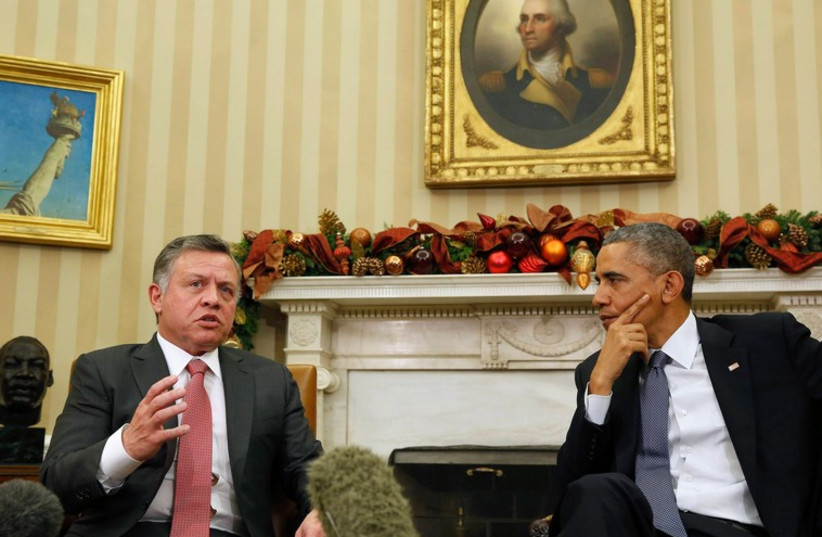 US President Barack Obama shakes hands with King Abdullah of Jordan in the White House, December 5, 2014. (photo credit: REUTERS)