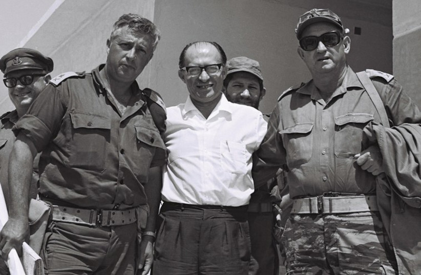 THEN-ISRAELI Major General Ariel Sharon is photographed with Likud party leader Menachem Begin and Major General Avraham Yoffe in the Sinai Peninsula in 1977. (photo credit: REUTERS)