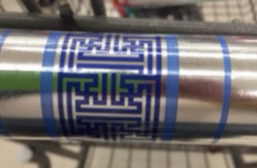 Walgreens wrapping paper with swastikas in design (photo credit: JTA)