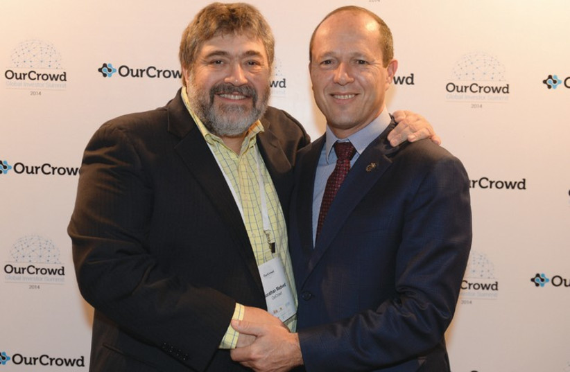 OURCROWD CEO Jonathan Medved (left) knows Jerusalem Mayor Nir Barkat (right) from when the latter was going ‘into deepest reaches of the American South’ to sell antivirus software (photo credit: MORAG BITAN)