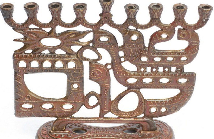 A bronze hanukkia made in the 1960s by Nomi and Arieh Schechter. (photo credit: COURTESY RA’ANANA MUNICIPAL GALLERY)