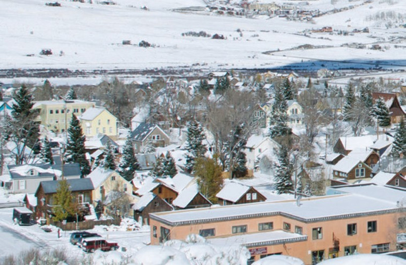A Jewish prayer services in Crested Butte, Colorado, 3,000 meters above sea level, congregants praise God on skis. (photo credit: Wikimedia Commons)