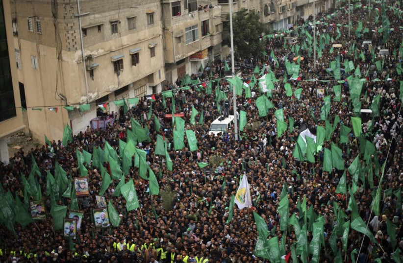 Gazans celebrate the 27th anniversary of Hamas' founding (photo credit: REUTERS,REBECCA FRIEDMAN)