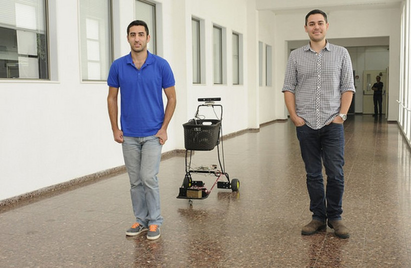  (L to R) Ohad Rusnak and Omri Elmalech with their tracking shopping cart (photo credit: SHARON TZUR, TECHNION)