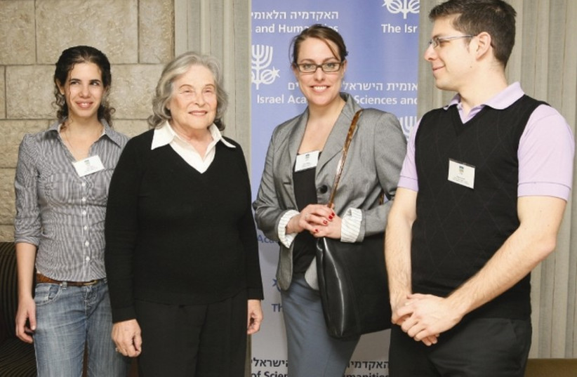 Prof. Ruth Arnon with would-be returnees from the Israel Academy of Sciences's 2013 employment fair and conference for scientists, physicians and engineers (photo credit: Courtesy)