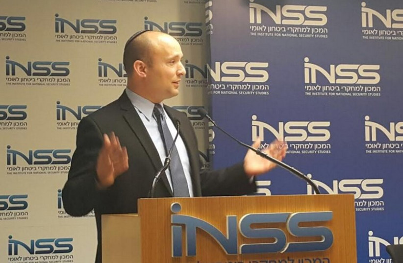 Economy Minister Naftali Bennett speaks at INSS in Tel Aviv, Dec. 18, 2014 (photo credit: BAYIT YEHUDI SPOKESMAN)