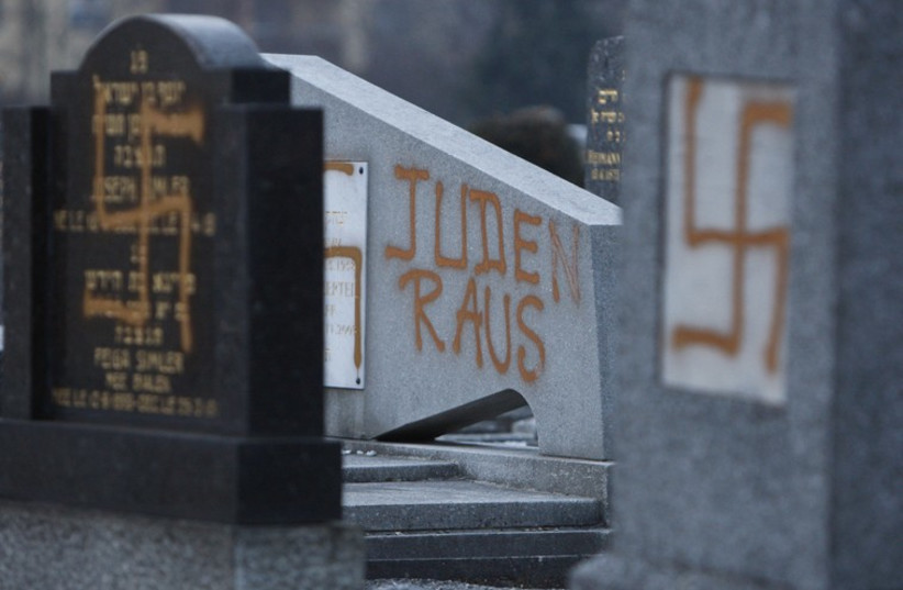 Swastika's at Jewish cemetery (illustrative) (photo credit: REUTERS)