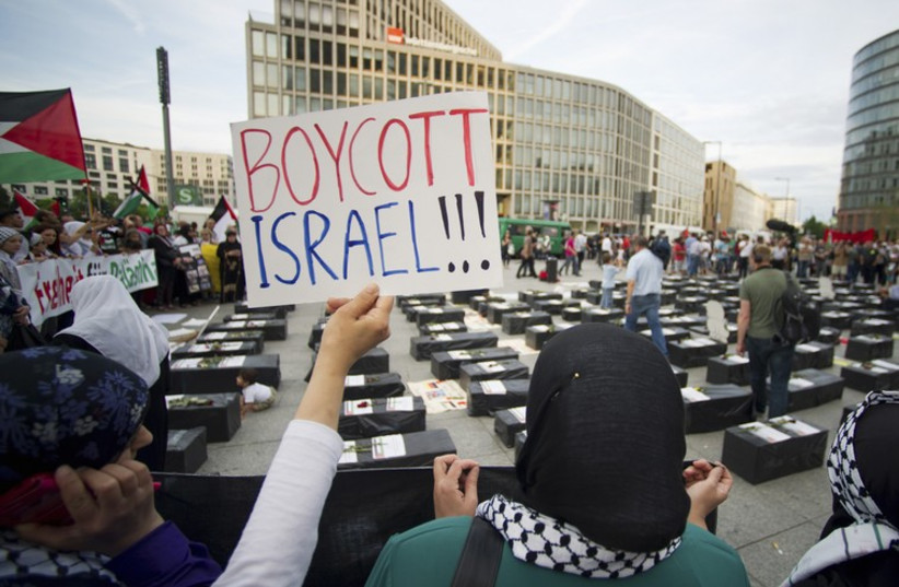 Protesters call for boycott of Israel [file] (photo credit: REUTERS)
