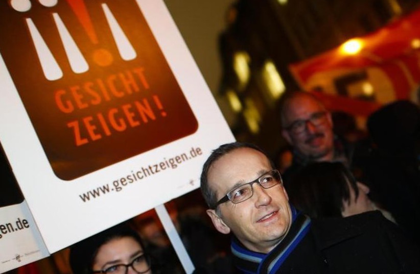 German Justice Minister Heiko Maas  protests an anti-Muslim demonstration in Berlin