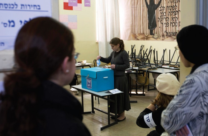 Haredi women vote in the 2013 elections. (photo credit: REUTERS)