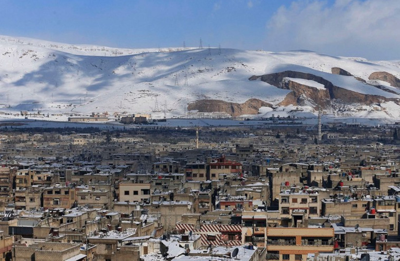snowy syria  (photo credit: REUTERS)