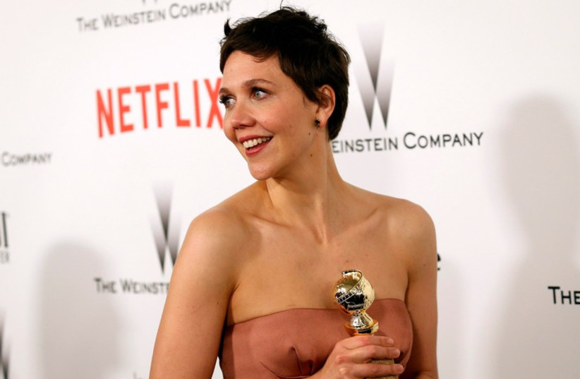 Actress Maggie Gyllenhaal arrives at the Weinstein Netflix after party after the 72nd annual Golden Globe Awards in Beverly Hills, California (photo credit: REUTERS)
