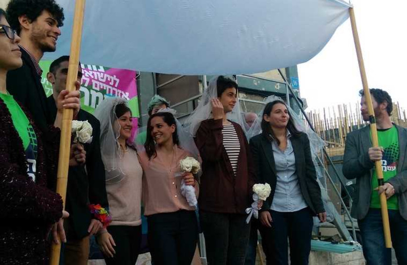 Meretz performs mock gay weddings outsided of Bayit Yehudi headquarters, January 12, 2015.  (photo credit: MERETZ)