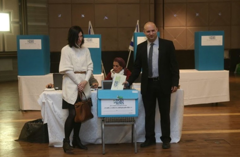 Nafatali Bennett votes in Bayit Yehudi primary (photo credit: MARC ISRAEL SELLEM/THE JERUSALEM POST)