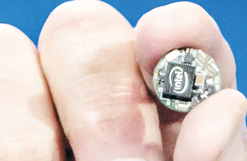 INTEL HAS developed a prototype module called Curie that is a microcomputer the size of a small button. (photo credit: INTEL)