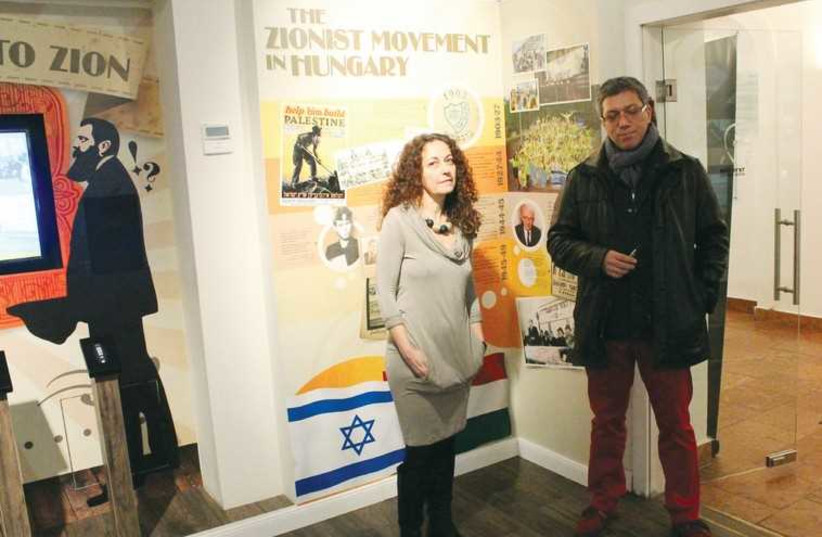 Vered Glickman  (left), director of the ICI, stands with co-chair Gabor Rona in the Herzl Center. (photo credit: BARRY DAVIS)
