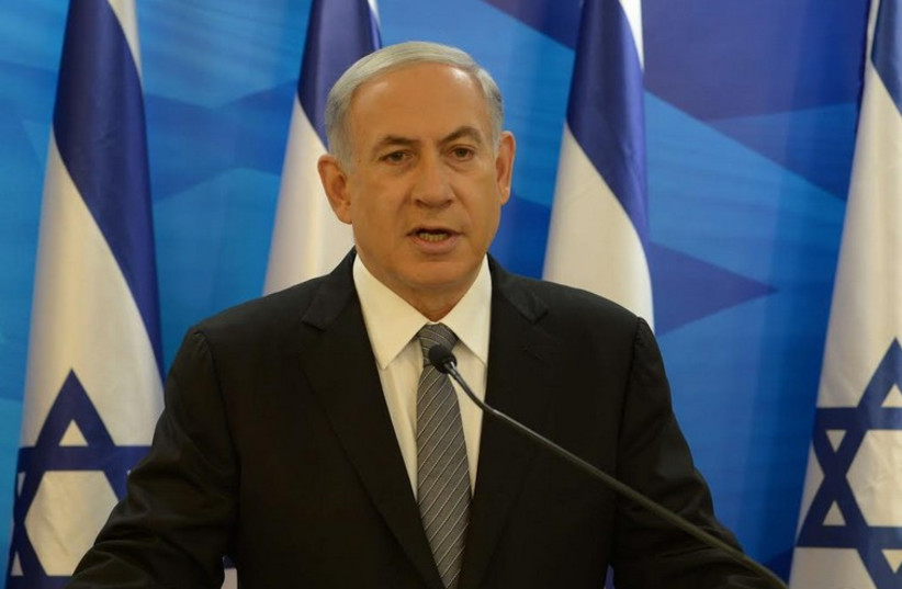 Bibi speaking against Palestinian ICC bid (photo credit: AMOS BEN GERSHOM, GPO)