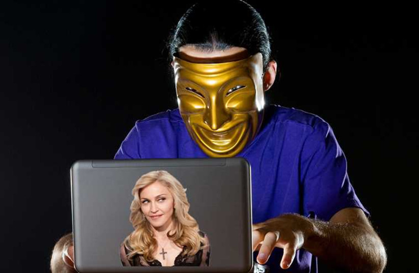 Hacking into Madonna's computer (illustrative) (photo credit: INGIMAGE,REUTERS,JPOST STAFF)