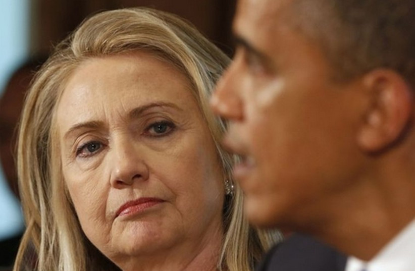 Hillary Clinton (L) and US President Barack Obama (R) (photo credit: REUTERS)