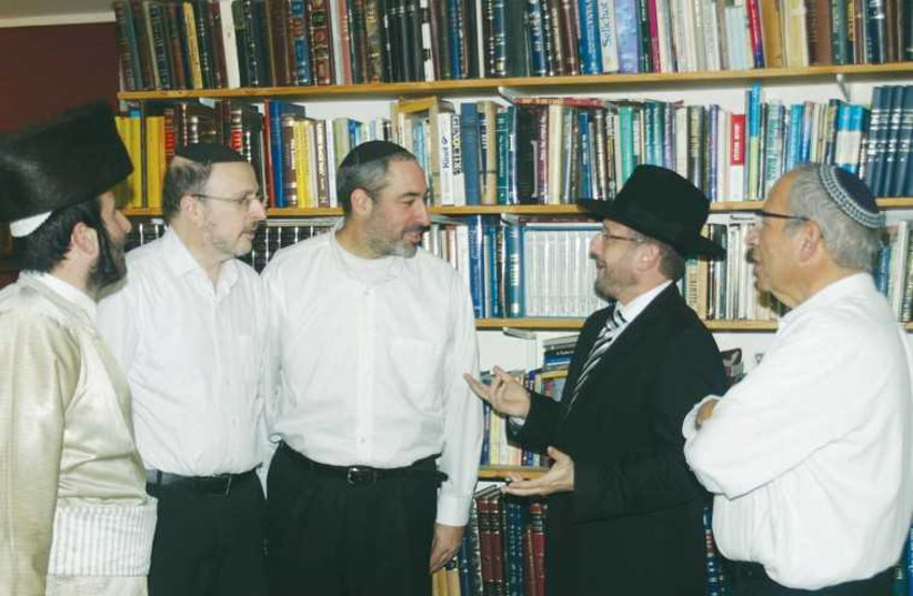 The founding group of the minyan. (From left to right) Aharele Perl, Ari Gerber, Goel Jasper, MK Dov Lipman and Shalom Lerner. (photo credit: MICHAEL LIPKIN)