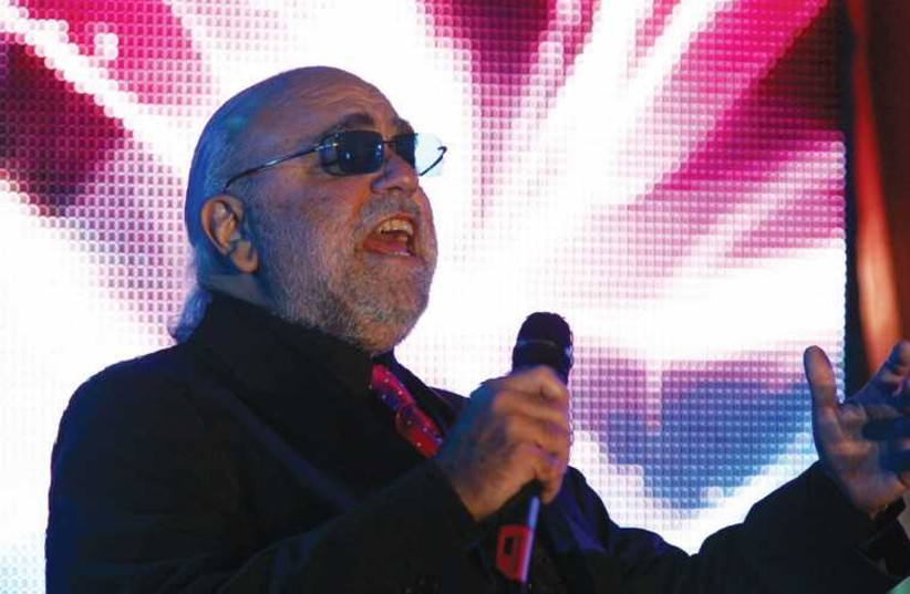 GREEK SINGER Demis Roussos performs during a private birthday party in Moscow’s New Manezh in 2006. (photo credit: REUTERS)