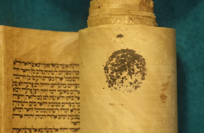 Antique Iraqi Torah scroll  (photo credit: MARC ISRAEL SELLEM)